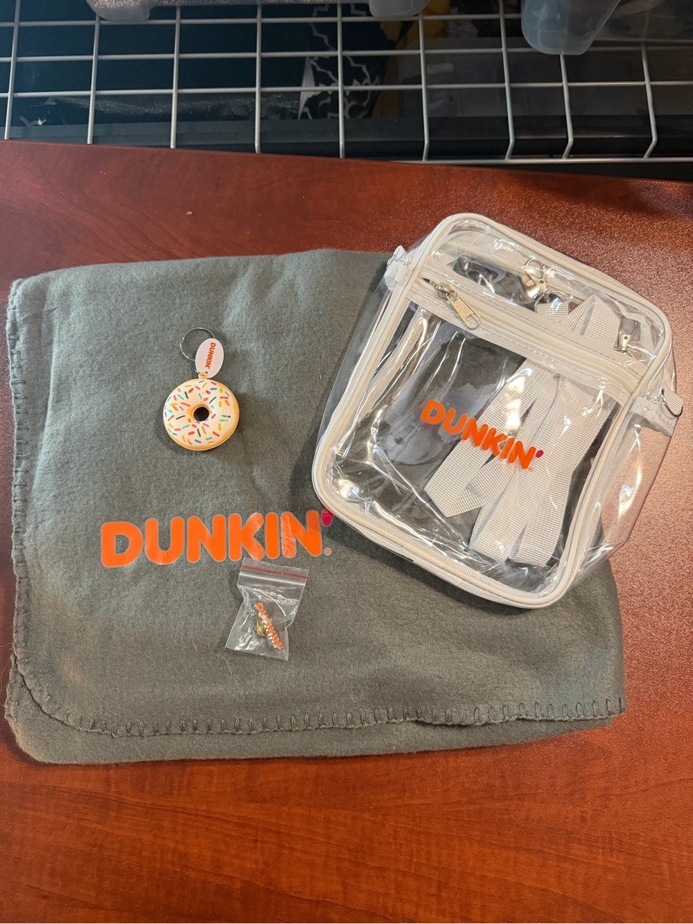 New Dunkin' Set of 4 Items: Blanket, Donut Keychain, Clear Crossbody Bag & Pin.